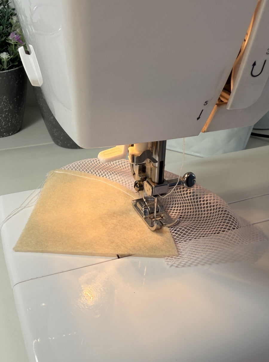 Sew the tulle to the felt